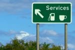 A road sign directing road users to a nearby service station