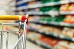 Supermarket aisles and close up of a trolley
