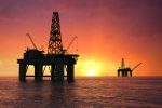 Oil rig at sunset