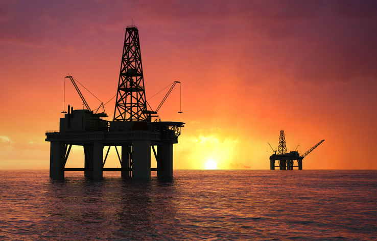 Oil rig at sunset